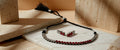Qala Gemstone Necklace With Matching Earrings